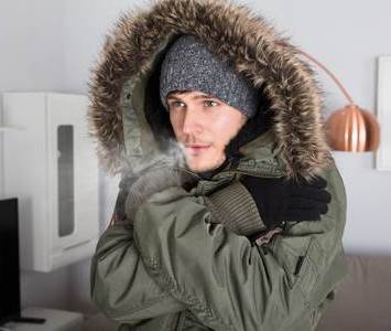 man in cold home