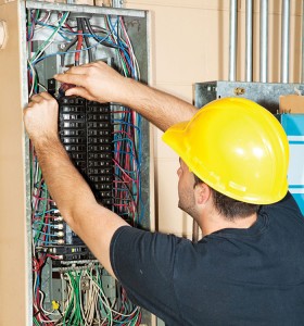 working on electrical panel